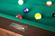 Up-close image of the Doc & Holliday Billiards name plate in brushed steel, highlighting brand detail on the Paula Parsons Slate Pool Table Up-close image of the Doc & Holliday Billiards name plate in brushed steel, highlighting brand detail on the Paula Parsons Slate Pool Table